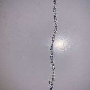 Tennis bracelet with october birthstone